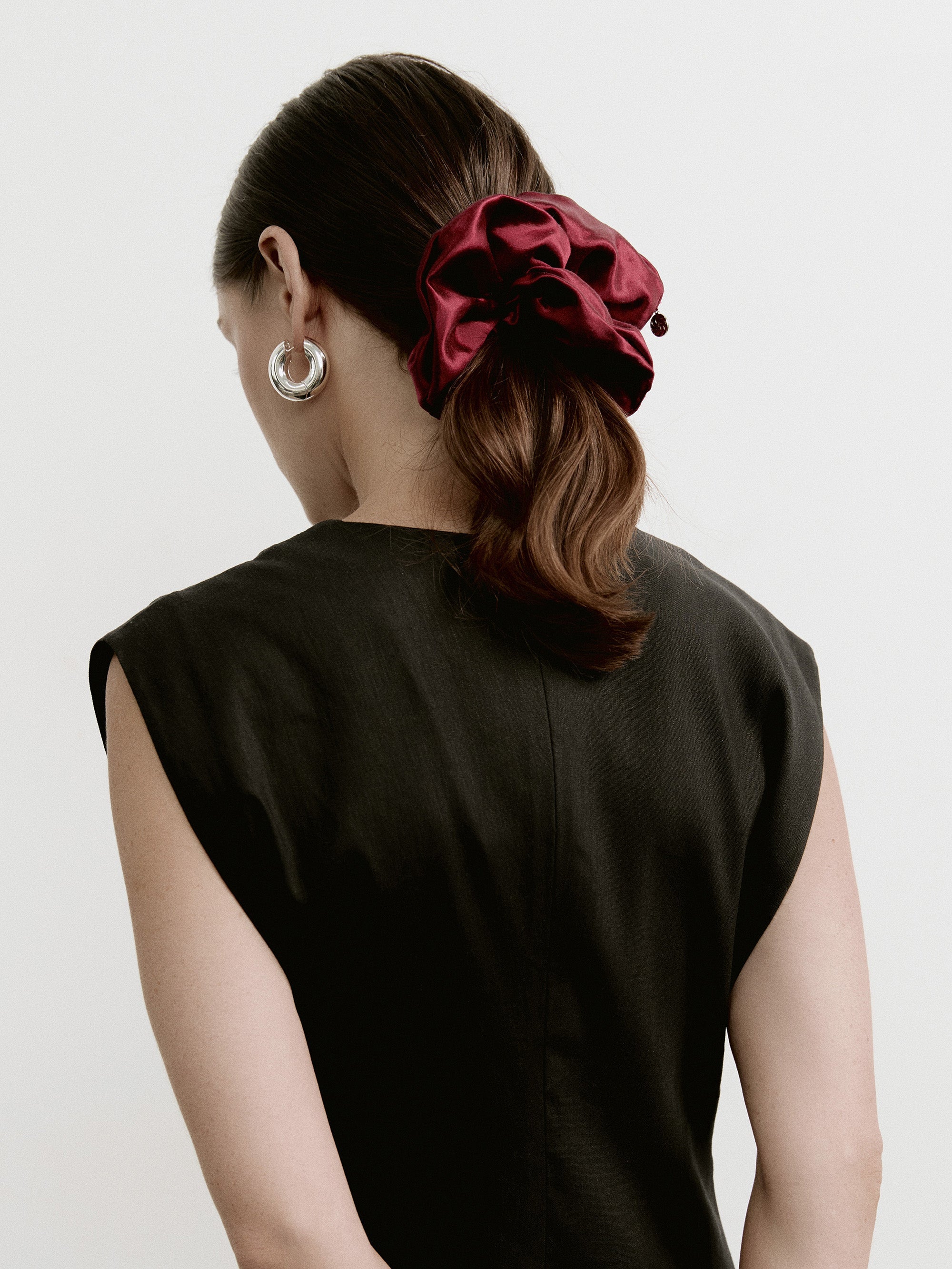 Oversized hemp scrunchie in Cherry Red - on-model, back view - CONTOUROSE