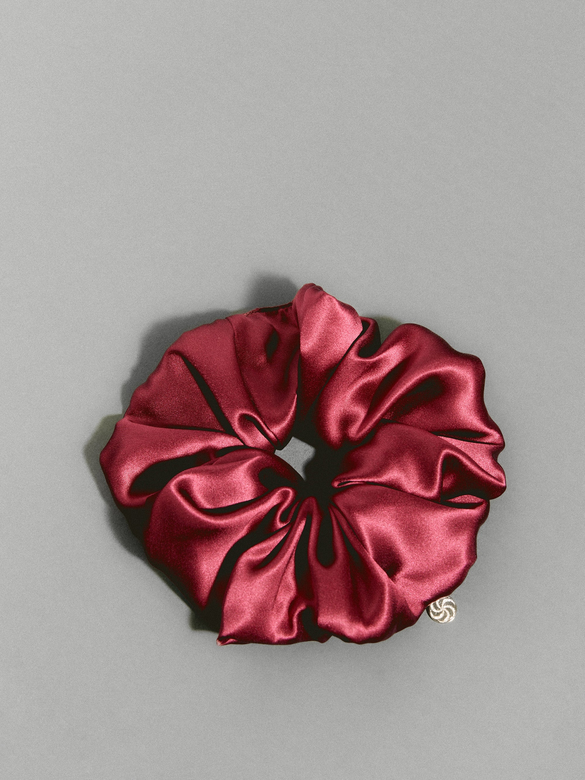 Oversized silk scrunchie in Bordeaux - packshot - gray background - CONTOUROSE