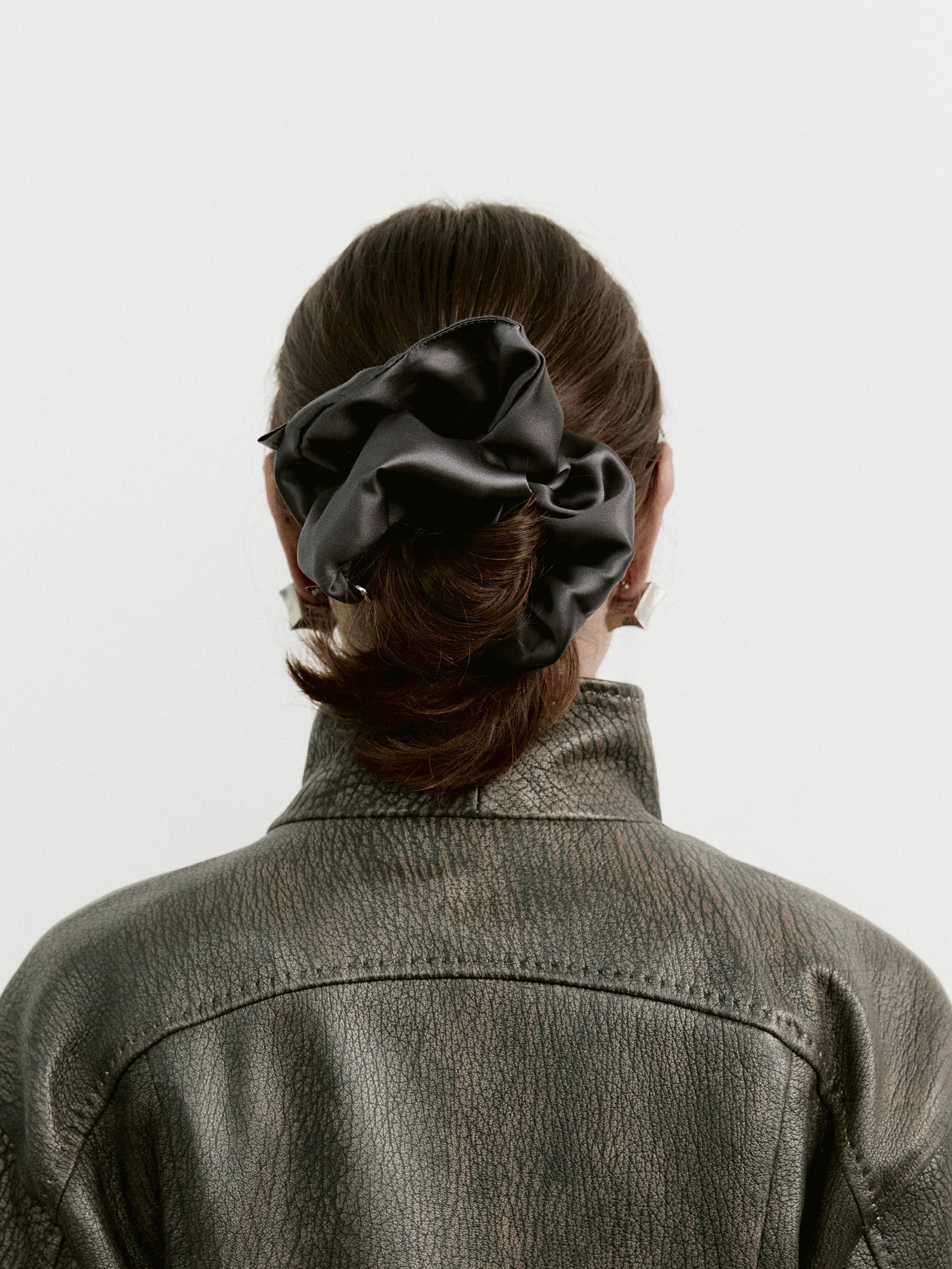 Oversized silk scrunchie in Dark Gray - on-model, back view - CONTOUROSE