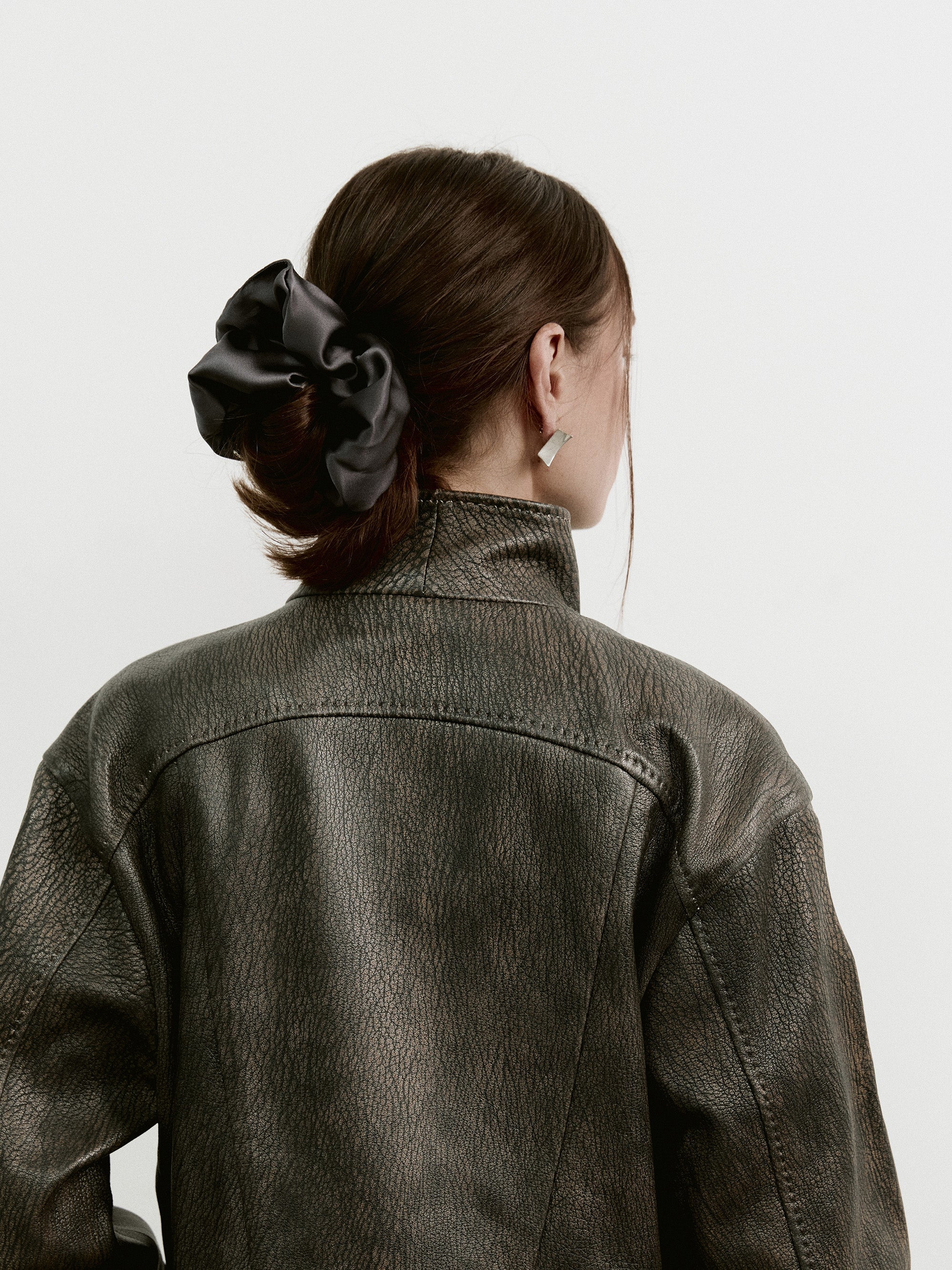 Oversized silk scrunchie in Dark Gray - on-model, profile right - CONTOUROSE