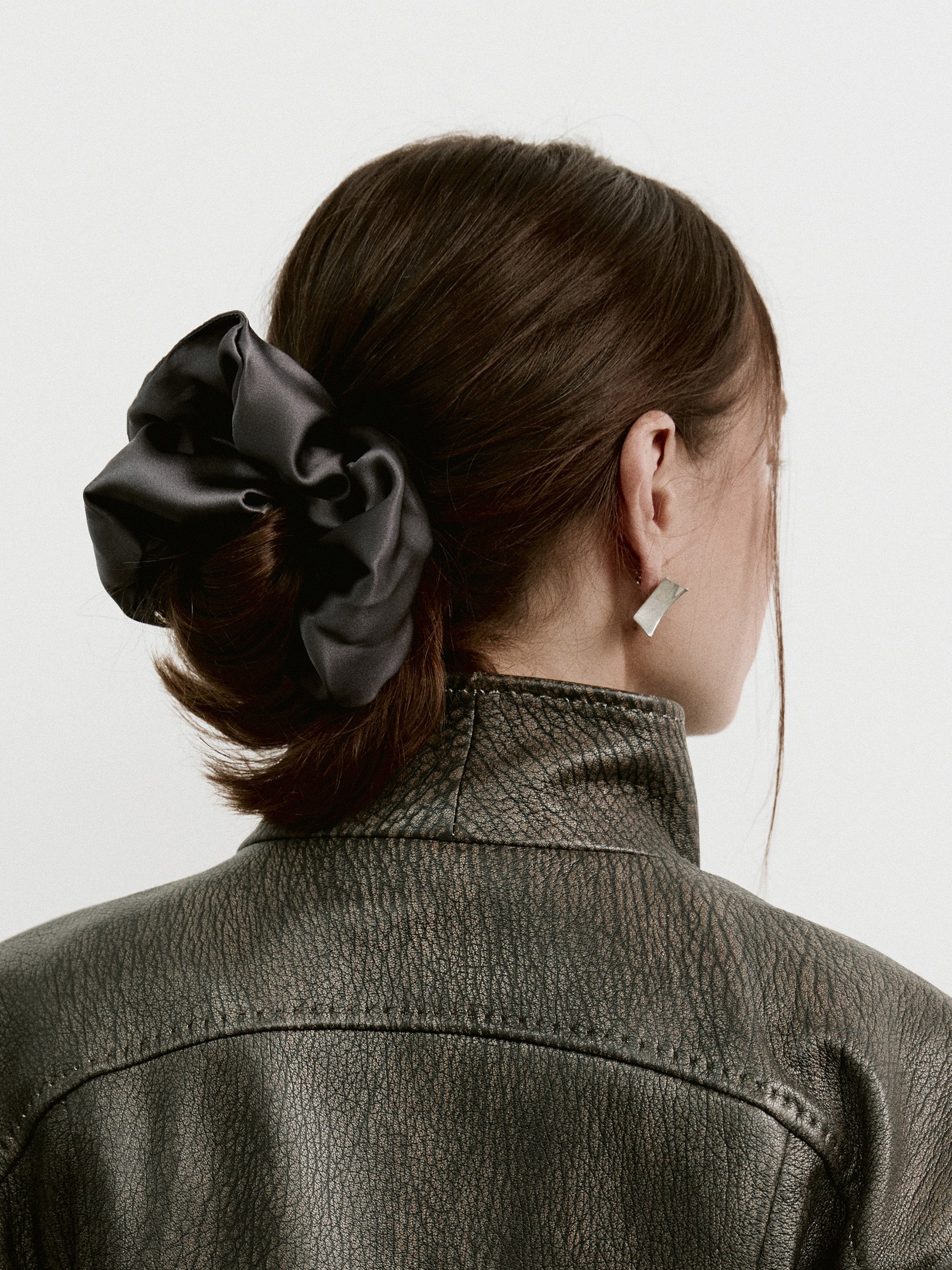 Oversized silk scrunchie in Dark Gray - on-model, profile, zoom view - CONTOUROSE