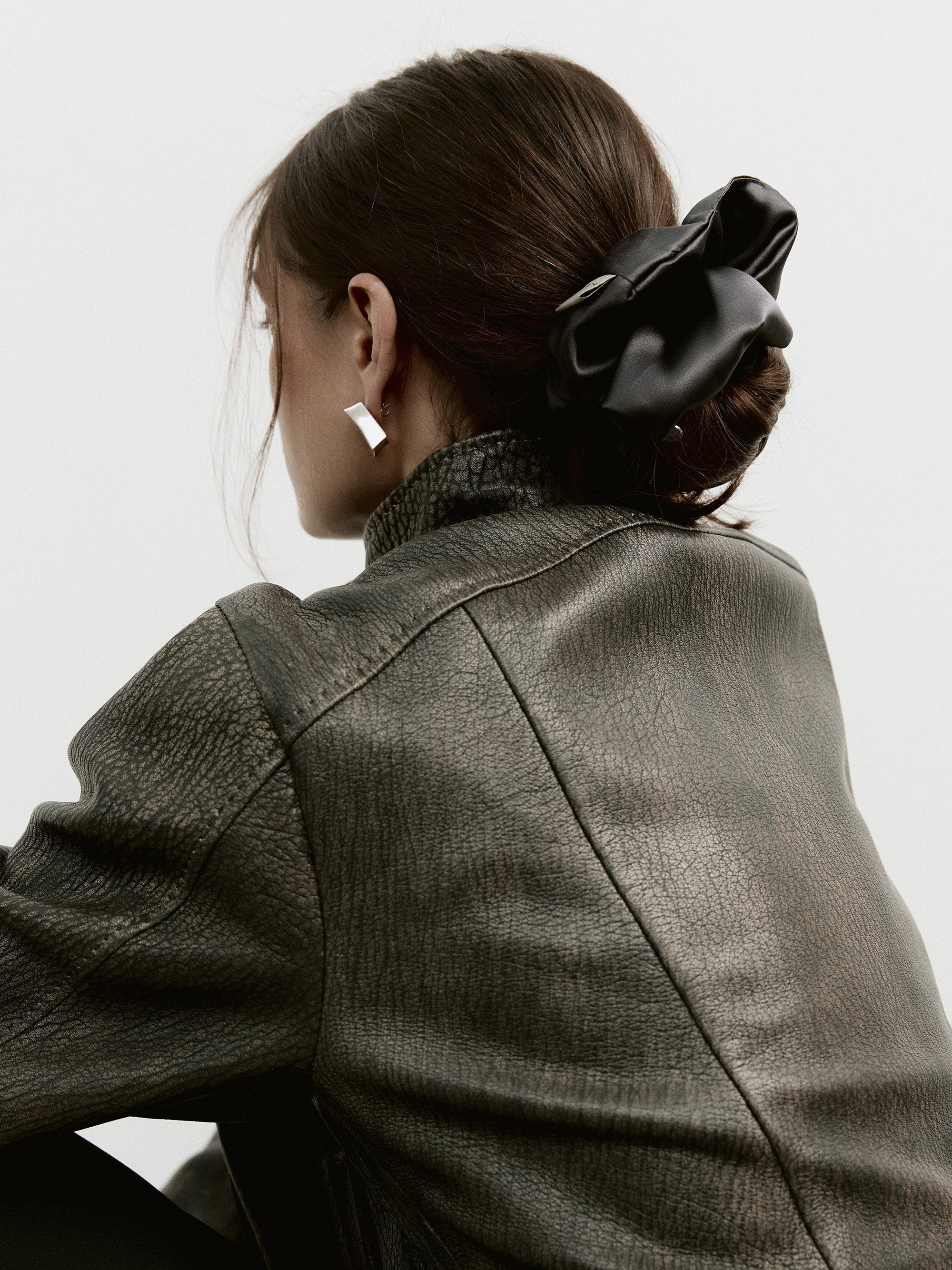 Oversized silk scrunchie in Dark Gray - on-model - CONTOUROSE