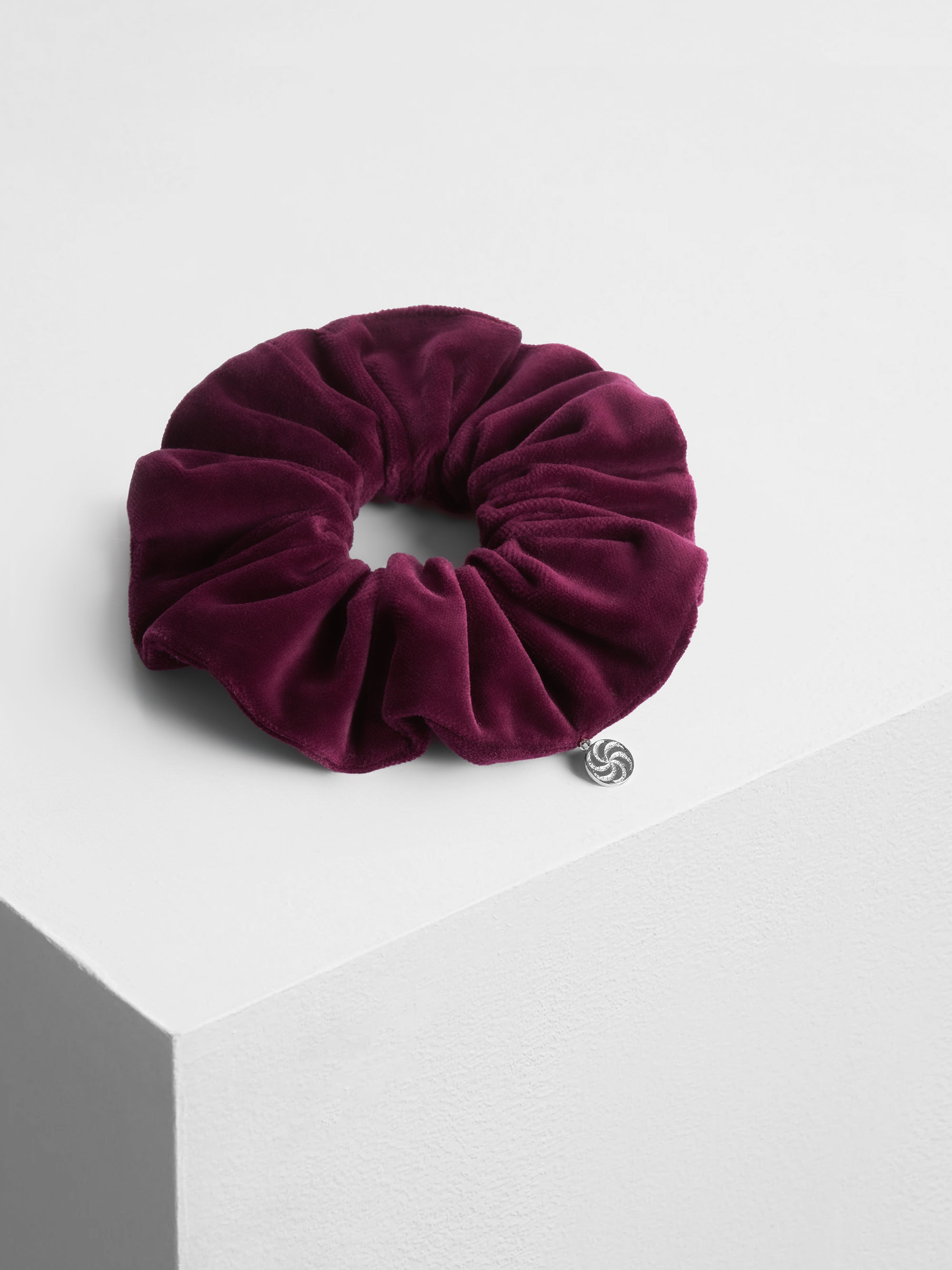 Velvet scrunchie in Burgundy - on pedestal - CONTOUROSE