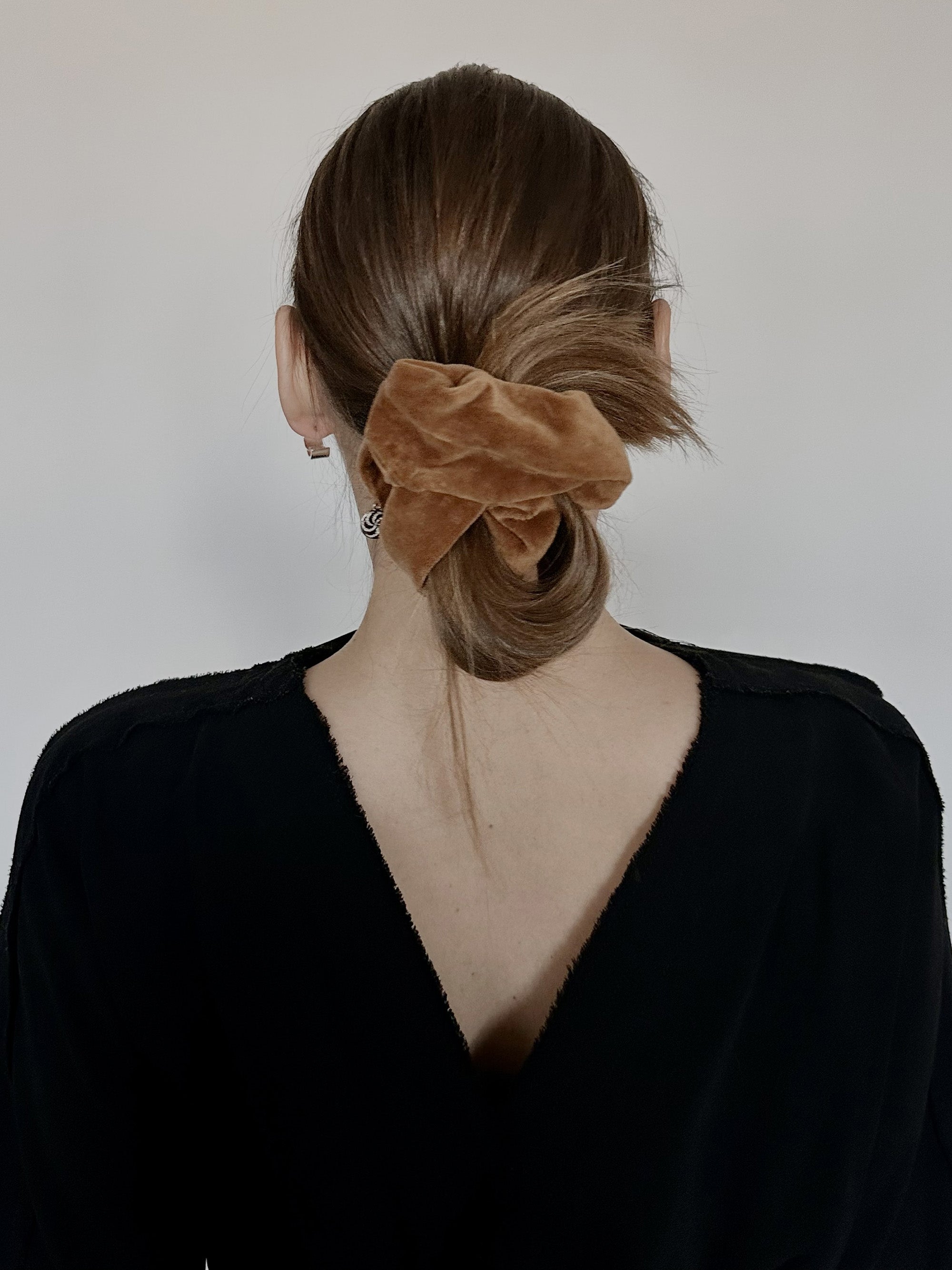 Velvet scrunchie in Caramel Brown — on model, back view — CONTOUROSE