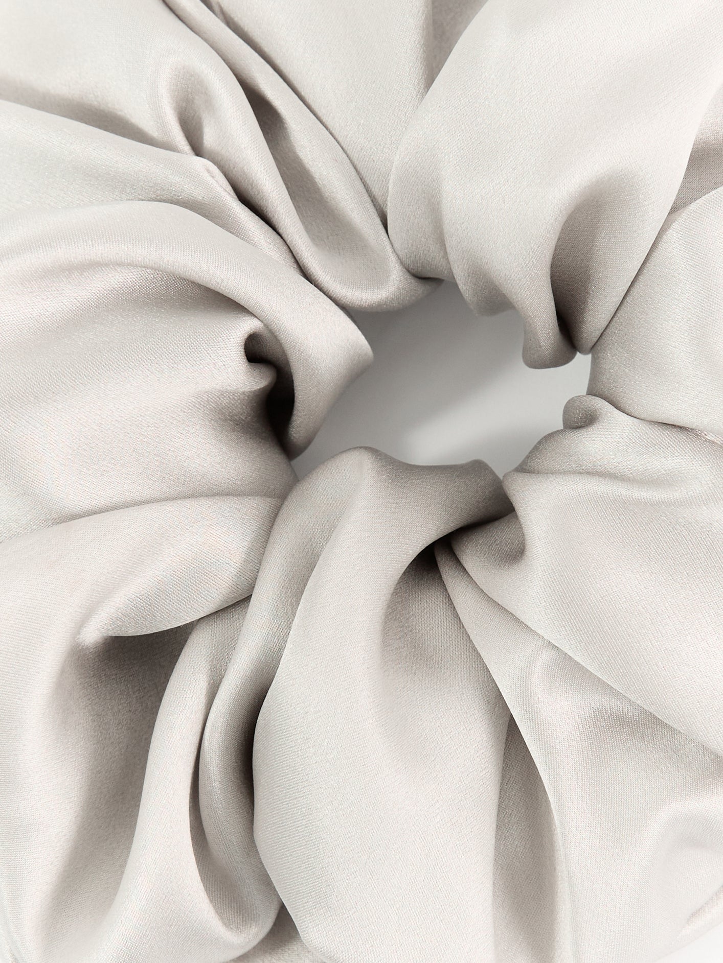 Oversized silk scrunchie in Silver Gray - packshot, on material - CONTOUROSE