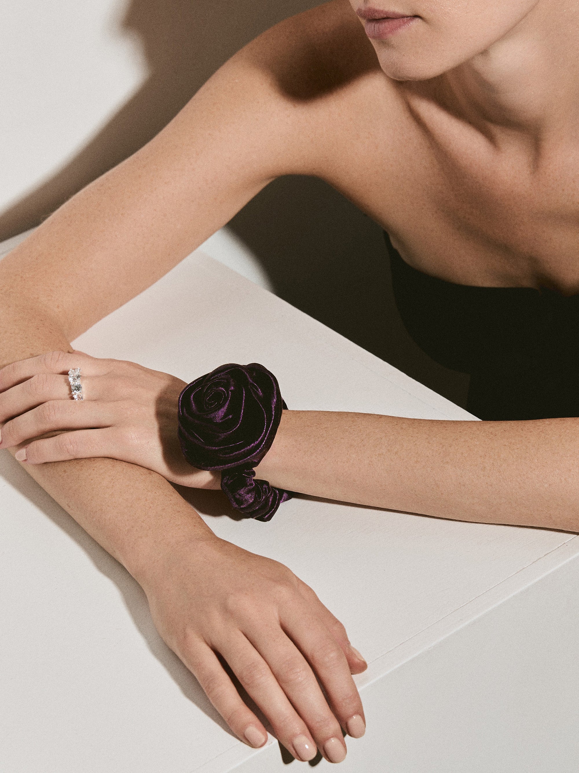 Rose scrunchie in Plum - on-model, on-hand - CONTOUROSE