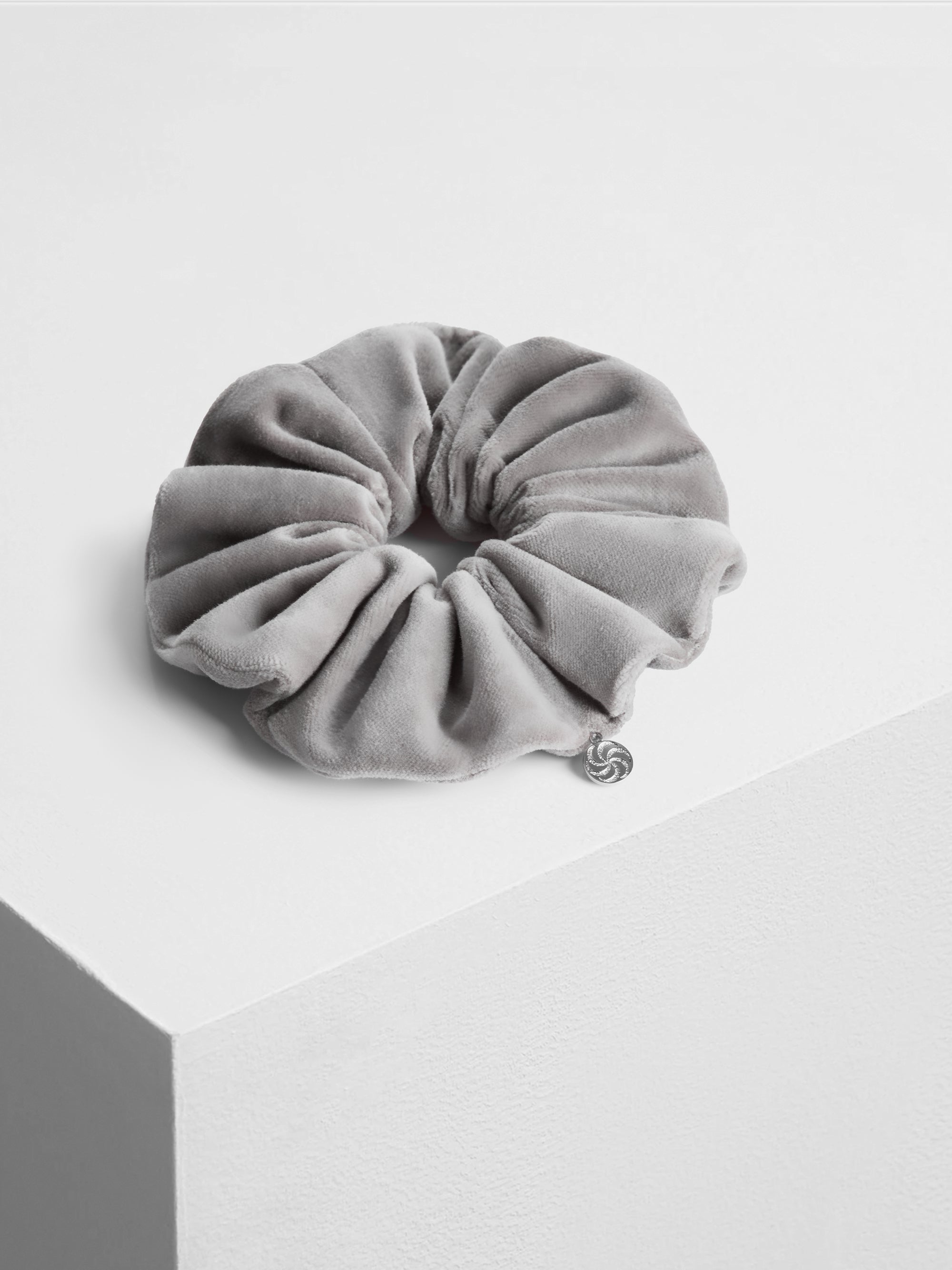 Velvet scrunchie in Gray - on pedestal - CONTOUROSE